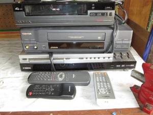 lot 91 image: SDTV tuner, VHS and DVD players...