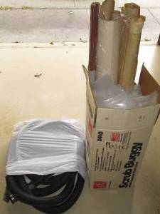 lot 100 image: Long drain hose and assorted plasti...