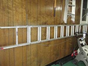 lot 103 image: 12 aluminum extension ladder...