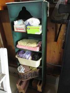 lot 113 image: Shelf filled with rags...