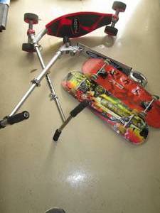 lot 131 image: Scooters and skateboards...