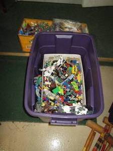 lot 139 image: Covered totes of Legos Bionicles...