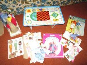 lot 206 image: Paper dolls and a metal game table...