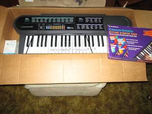 lot 9 image: Concertmate electric keyboard with ...