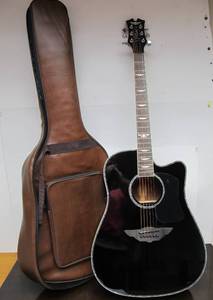 lot 138 image: Great Condition URBAN Guitar Player Acoustic Guitar by Keith Urban