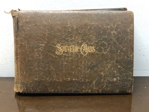 lot 312 image: Antique Album Full of Old Postcards 