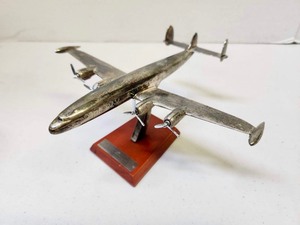 lot 424 image: Smaller Silver Plated Airplane Display Statue wStand