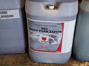 lot 549 image: Lot of (1) DuBois Blendco Systems Red Rhino Rhino Foam Explus Red Vehicle Cleaner 109506R 6-gallon Plastic Jug