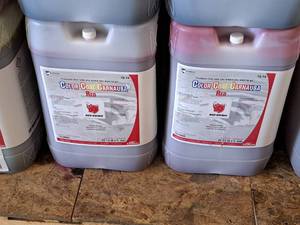 lot 552 image: Lot of (2) DuBois Blendco Systems Red Rhino Color Coat Carnauba Red Vehicle Cleaner 151406R 6-gallon Plastic Jug