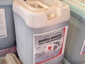 lot 547 image: Lot of (1) DuBois Blendco Systems Red Rhino Rhino Sheen Clear Coat Protectant 108606 6-gallon Plastic Jug
