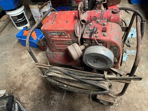 lot 13 image: Lincoln Weld And Power Gas Powered Wheeled Welder Generator