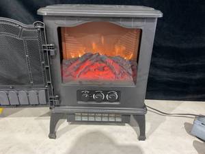 lot 587 image: Mainstays New 2-Setting 3D Electric Stove Heater with Life-like Flame