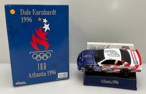 lot 77 image: 1996 Atanta Olympics Dale Earnhadrt Limited Edition 124 Scale Stock Car On Cion Base (NIB)