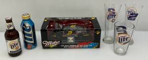lot 80 image: Group Of Misc. Rusty Wallace Collectibles Including Signed Beer Can , Die Cast Car & More