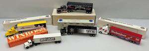 lot 107 image: Misc. Diecast Collectible Semi Trucks (NIB)