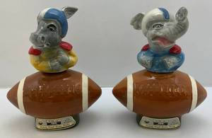 lot 158 image: Vintage Jim Beam Donkey And Elephant Football Decanters 10 T x 8 W