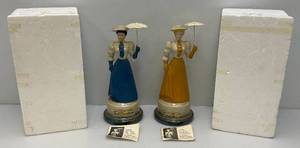 lot 225 image: Two Jim Beam Gibson Girls Decanters (Empty)
