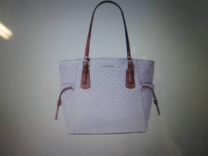 lot 317 image: Michael Kors Voyager Signature East...