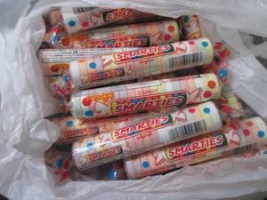 lot 412 image: 12- 2.75 oz Smarties...