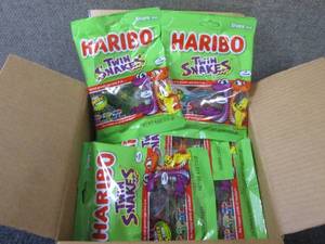 lot 445 image: 12- 4 oz Haribo Twin Snakes Gummi C...