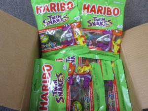 lot 447 image: 12- 4 oz Haribo Twin Snakes Gummi C...