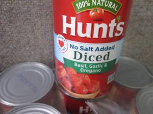 lot 491 image: 12- 14.5 oz Hunts Diced Basil, Garl...