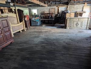 Garage full of antique and high end furniture