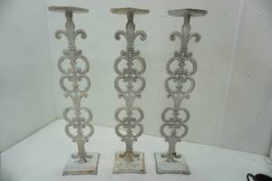 lot 126 image: Vintage cast iron candle or flower stands