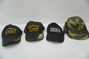 lot 142 image: Vietnam veterans hats an hunting hat