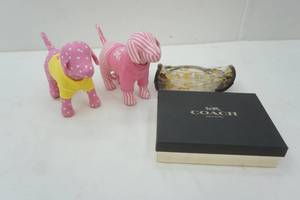 lot 143 image: Pink collectible stuffed dogs and logo items