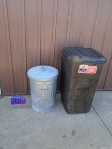 2 used garbage cans. As shown.