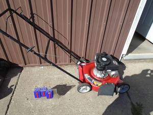 MTD push mower. Runs good. As shown.