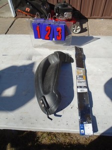 Mower blades & mulching cover. As shown. Fits Husquvarna. New condition. As shown.