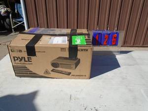 Pyle prjand615 full hd projector player. Indooroutdoor. Appears new in box. No remote. But has function key console. As shown.