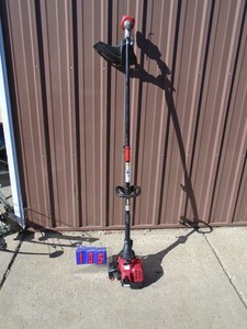 Troy Bilt gas weed trimmer. Tested & works. As shown.