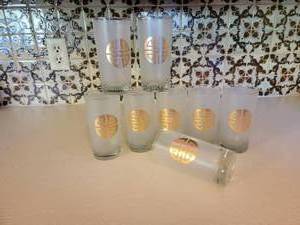 lot 33 image: Gumps Frosted Hi Ball Glassware with  Gold Asian Medallion