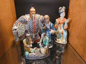 lot 70 image: Oriental Mud Man Figure Group