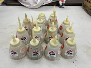 lot 52 image: Vintage Standard Oil American Oil Plastic Cans with Spouts