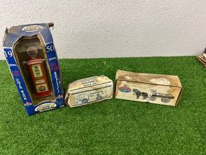lot 58 image: Amoco Gas Pump Replica & Fuel Trucks