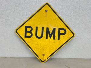 lot 143 image: Decommissioned Road Sign - BUMP