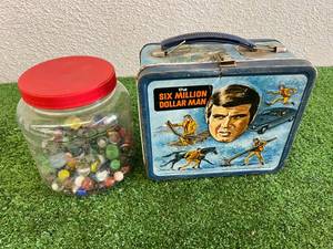 lot 170 image: Six Million Dollar Man Lunchbox & Marbles