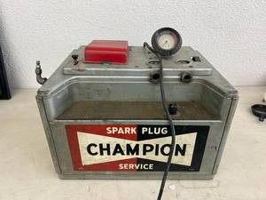 lot 173 image: Champion Spark Plugs Service Machine