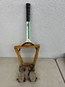 lot 193 image: Tennis Racket & Roller Skates
