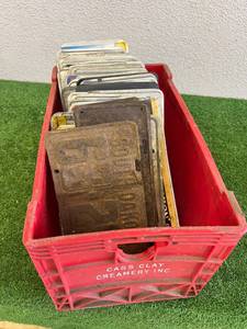 lot 224 image: Cass Clay Creamery Tote of License Plates