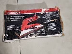 Carpet seaming iron