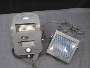 lot 42 image: MOULTRIE TRAIL CAM AND POWER PANEL