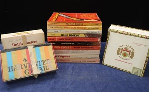 lot 67 image: GUN DIGEST BOOKS & CIGAR BOXES