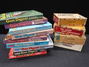lot 76 image: GUN DIGEST BOOK SET AND CIGAR BOXES