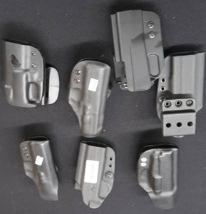 lot 150 image: HARD PLASTIC HOLSTERS