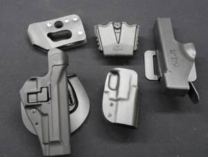 lot 152 image: HARD PLASTIC HOLSTERS
